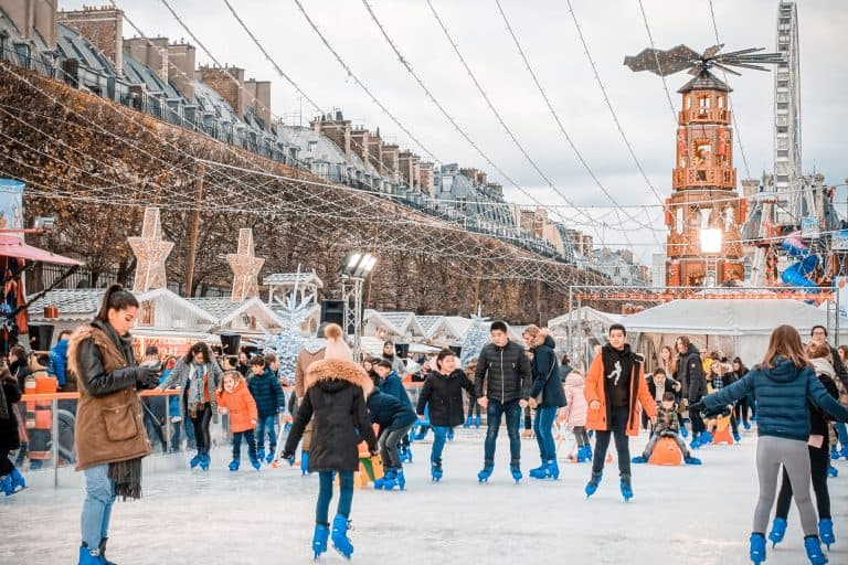 ourists at the Christmas Market in the Tuileries Garden in Paris